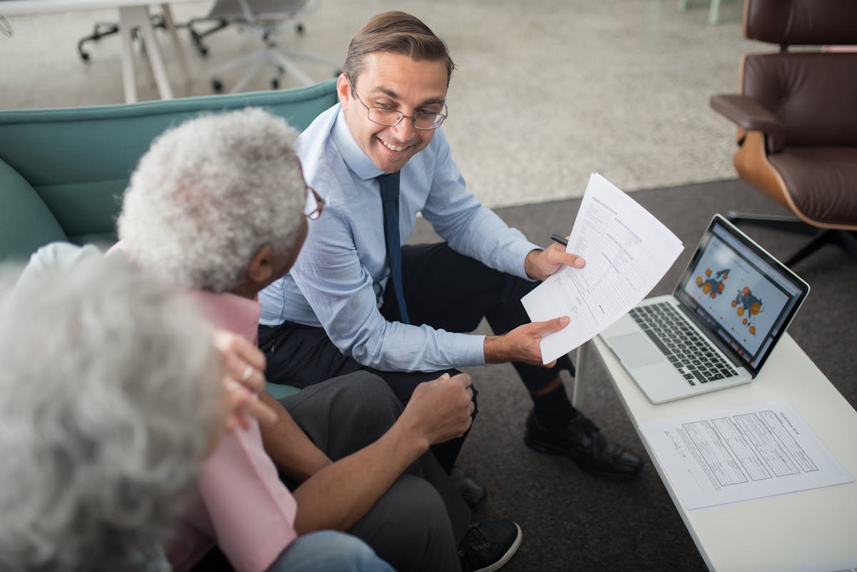 Financial advisor meeting with clients